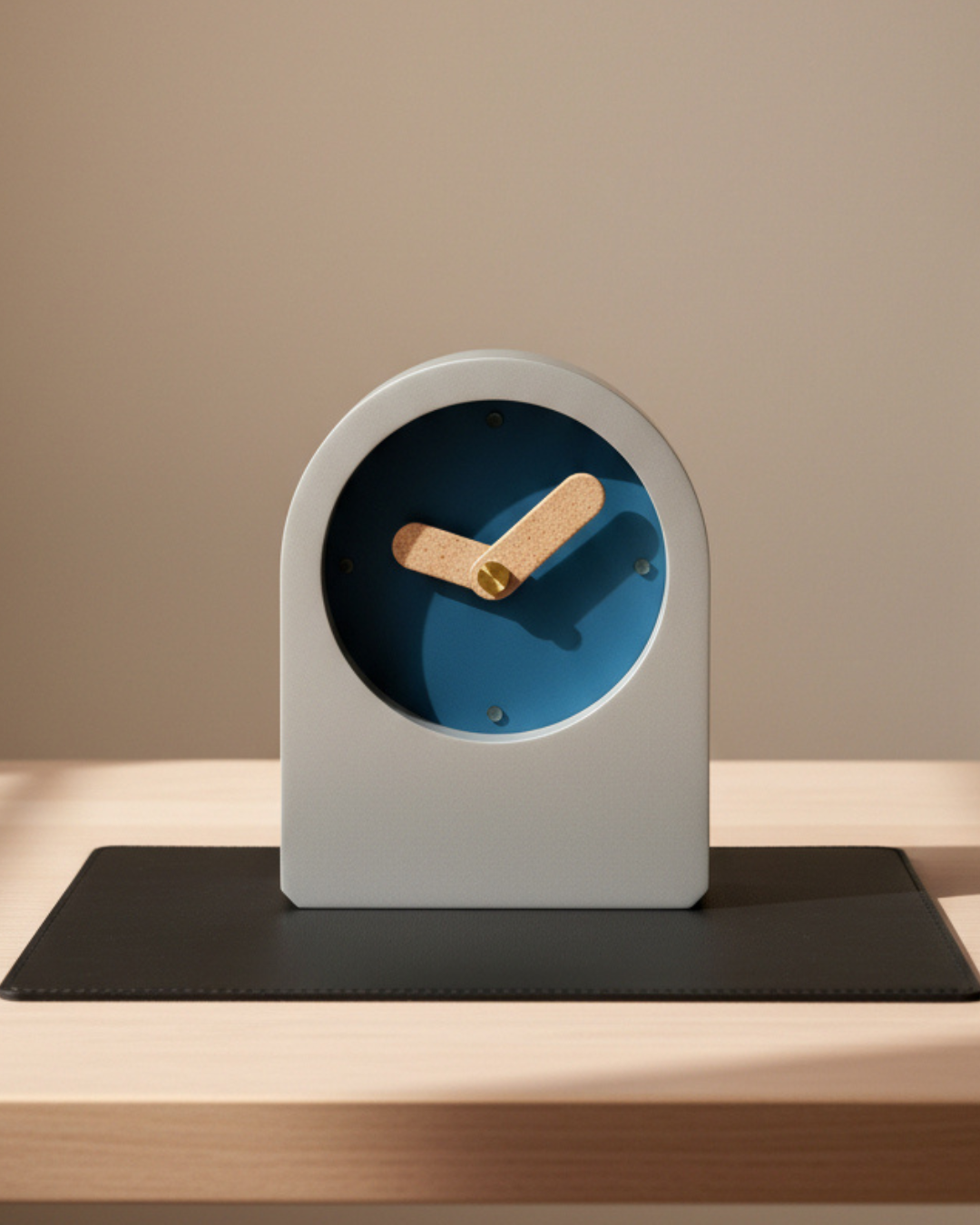 Modern minimalist analog table clock on office desk