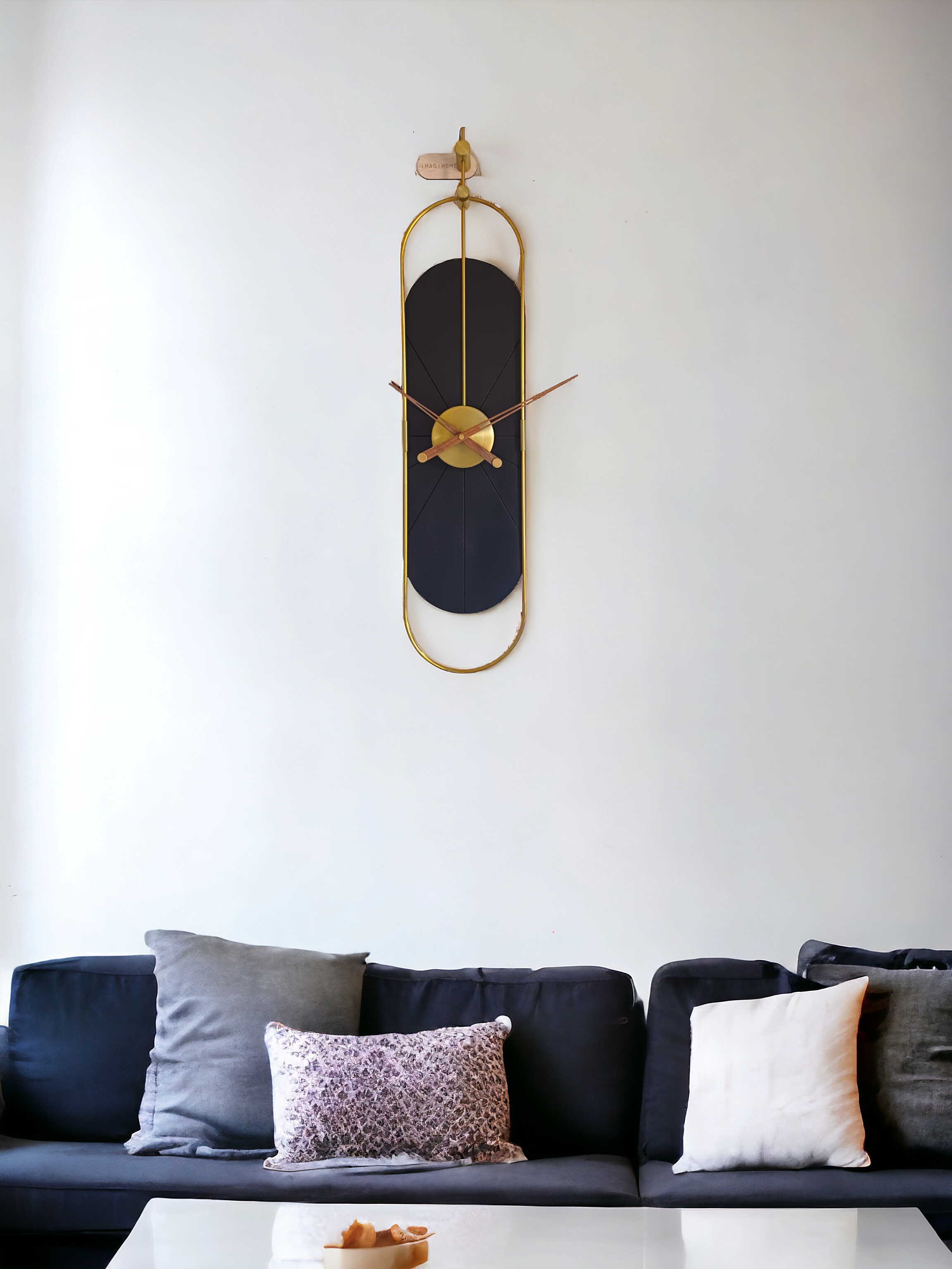 Black Capsule Wall Clock with Golden Metal Frame