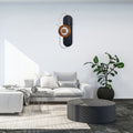 black abstract wall clock