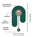 green pendulum wall clock