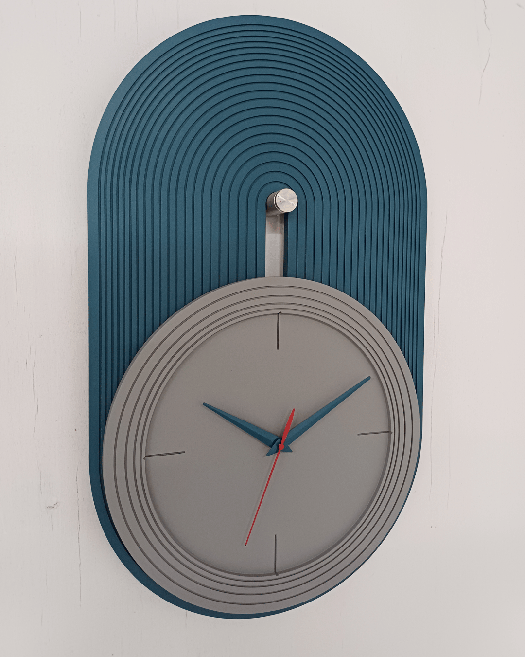 large wall clock in blue and grey