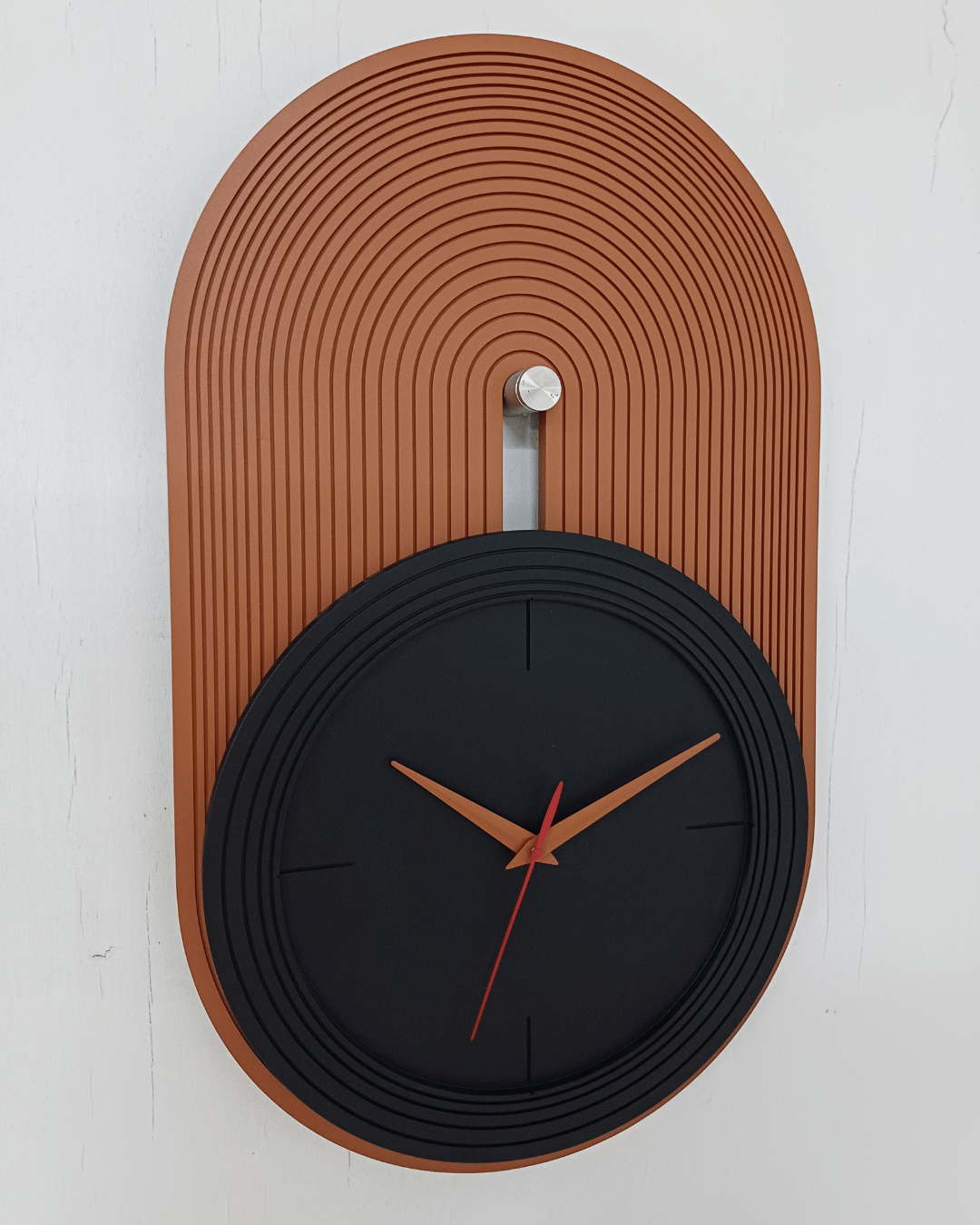 modern black and orange clock